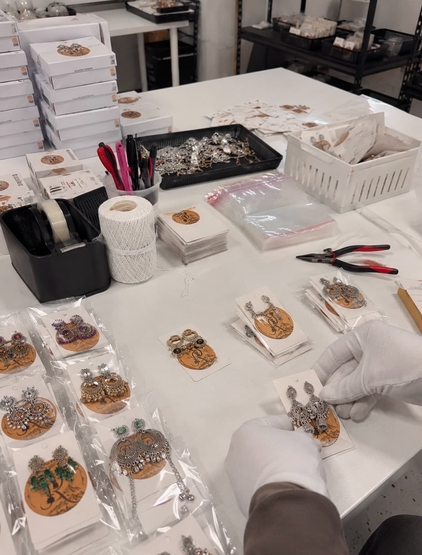 Artisans handcrafting jewelry at the Reema workshop